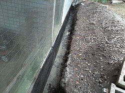 Poured concrete to fix busted up footer