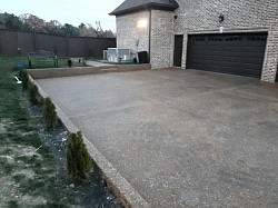 Preventive maintenance pressure washed and sealed driveway